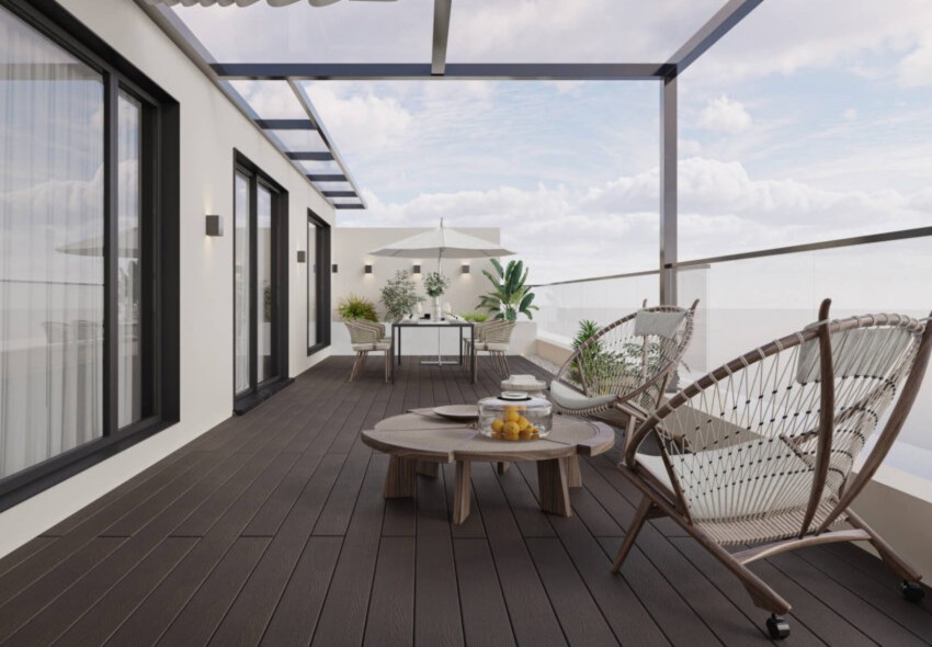 Walnut brown composite decking on a covered roof terrace Walnut brown composite decking on a covered roof terrace